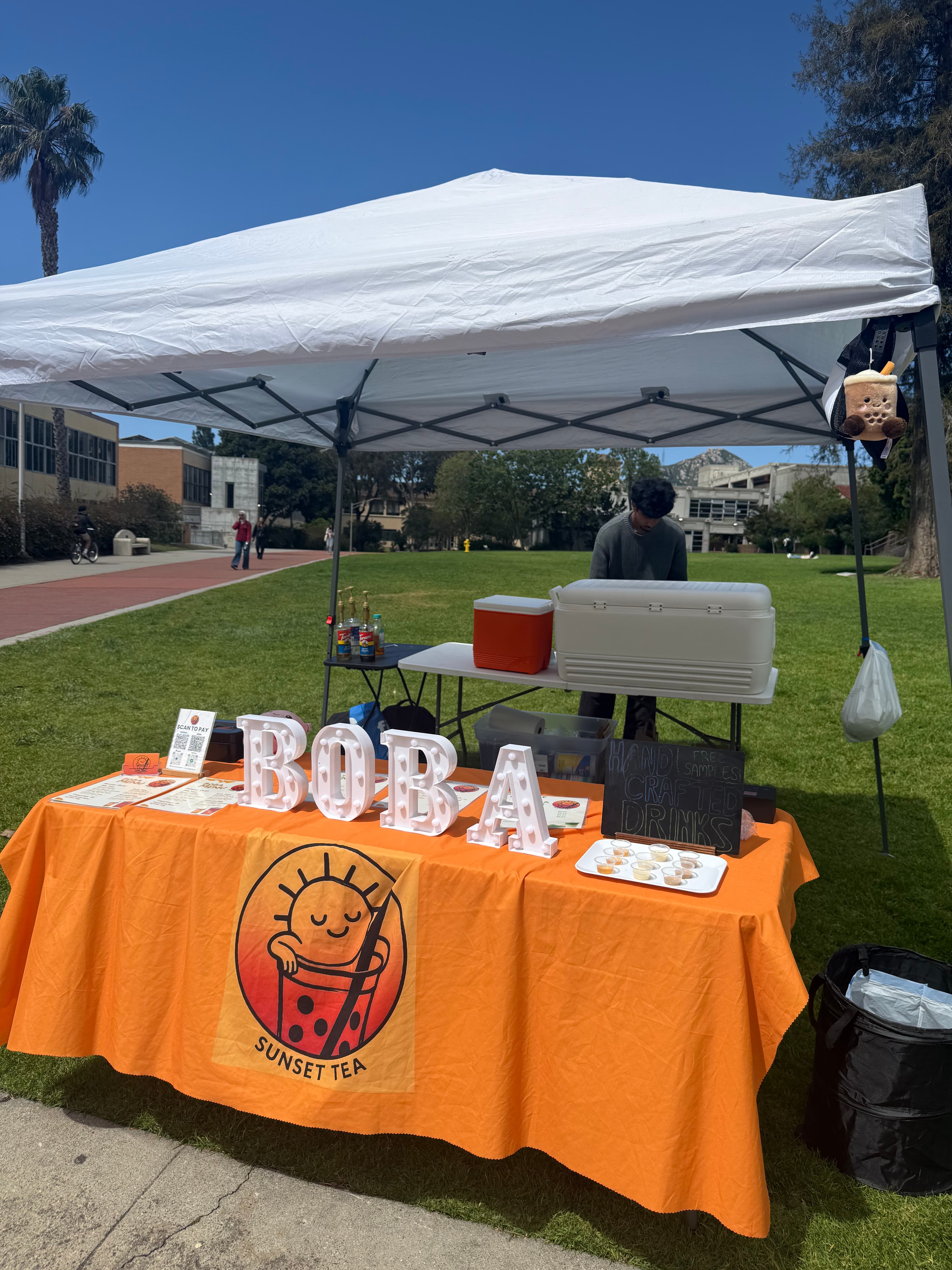 Sunset Tea booth at a pop-up event